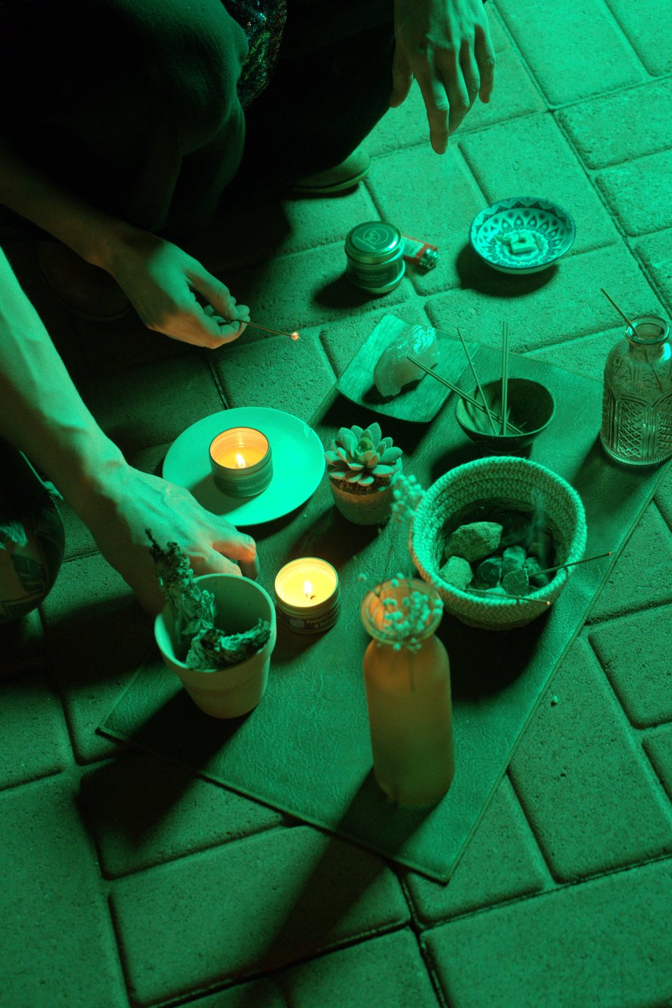 Cups arranged around a candle during the gathering